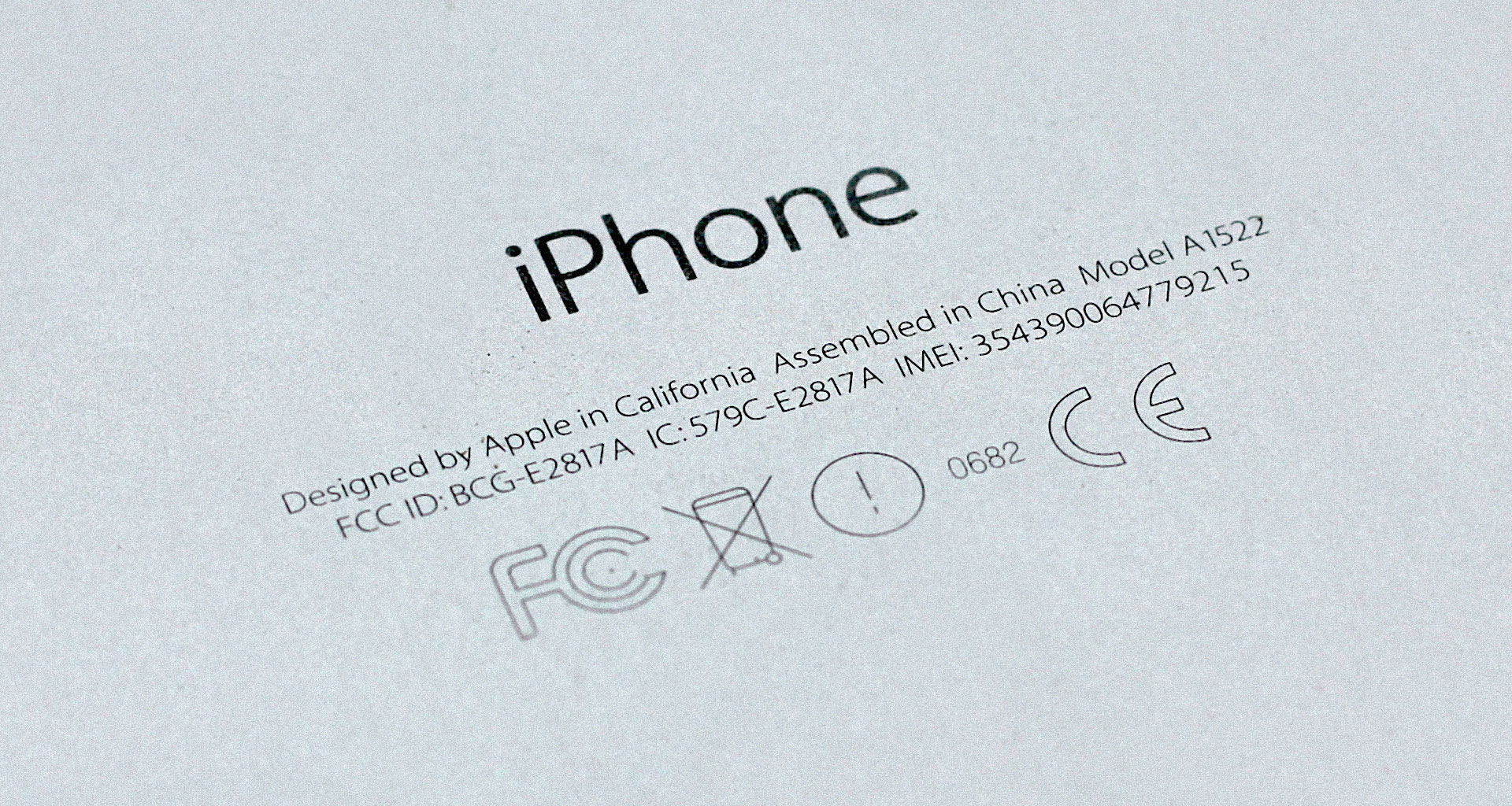 iphone - designed by apple in California, assembled in China © Copyright Joseba Attard